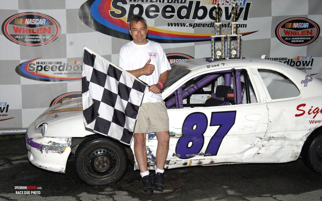 Black and white abstract pattern with concentric circles and wave shapes.