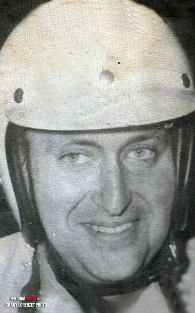 Black and white abstract pattern with concentric circles and wave shapes.