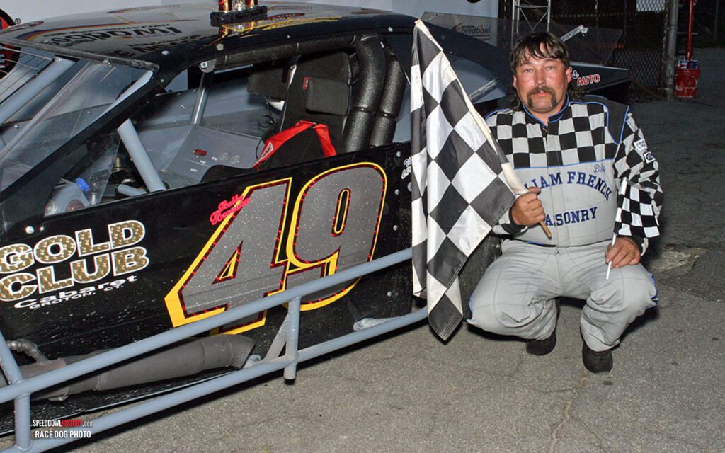 Black and white abstract pattern with concentric circles and wave shapes.