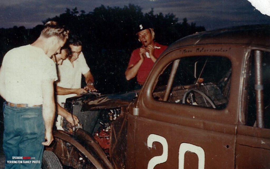 Black and white abstract pattern with concentric circles and wave shapes.