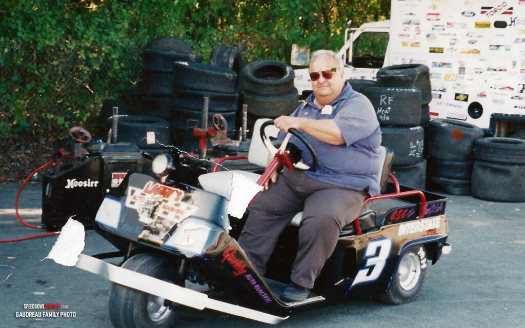 Black and white abstract pattern with concentric circles and wave shapes.